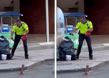 Trafik polisinden alkışlanacak hareket: Çöpe atılan Türk bayrağını aldı