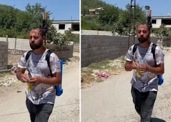 50 derecelik Hatay sıcağına enteresan tahlil: Sırtında duş başlığıyla gezdi