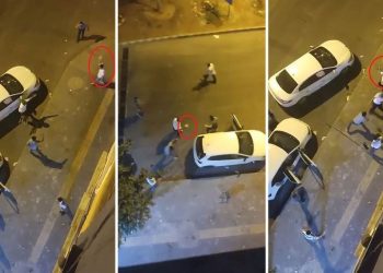 İki küme ortasında taşlı, sopalı, tabureli arbede